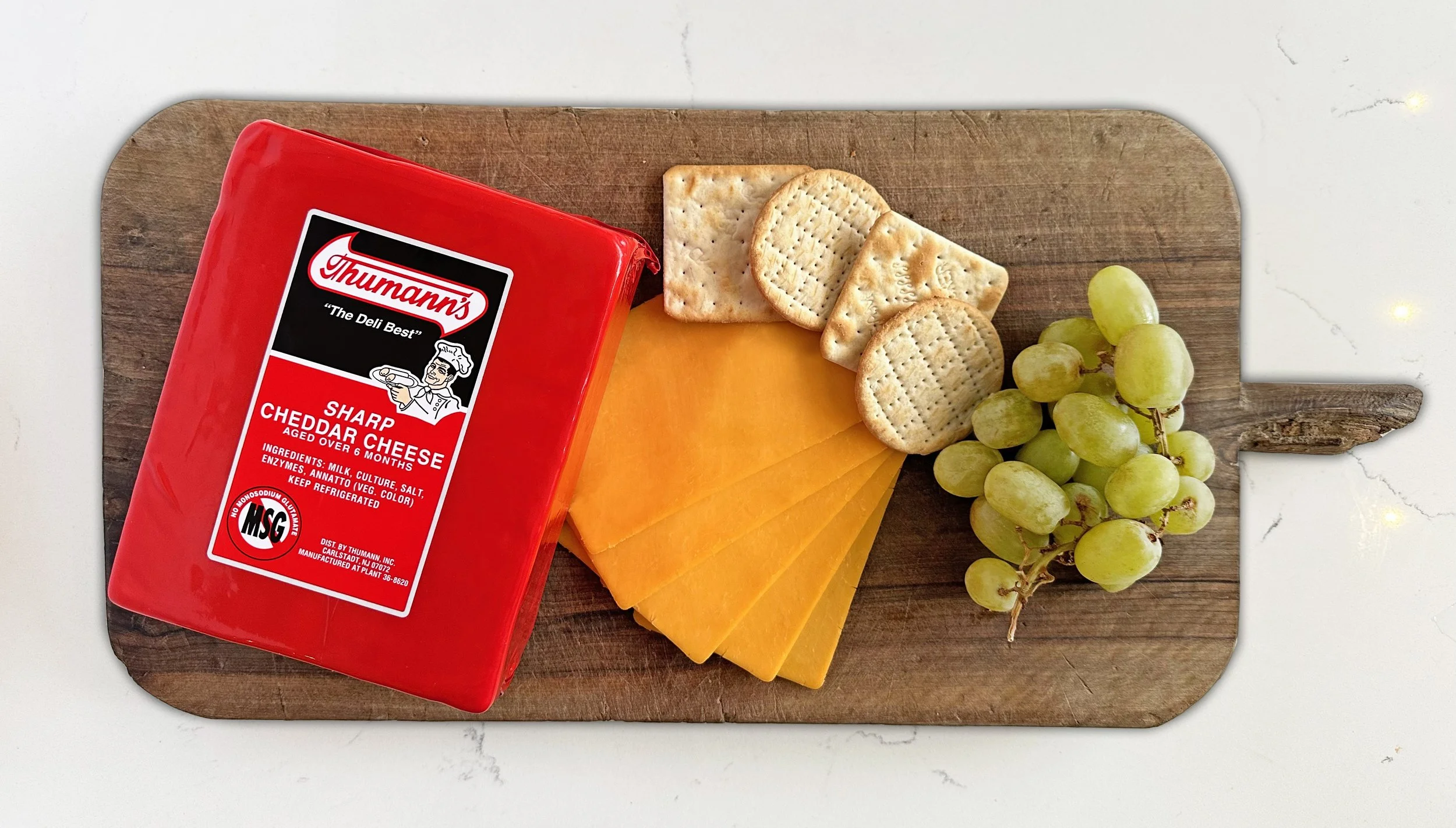 Thumann's Sharp Cheddar Cheese compares to Sargento and Cabot and Tillamook