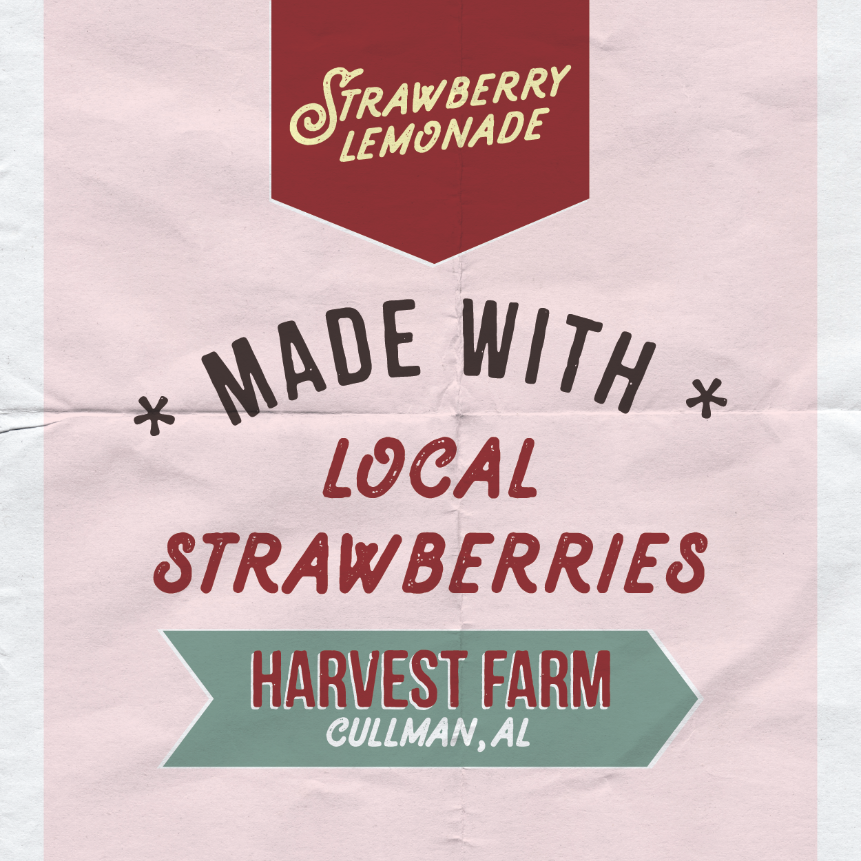 Label advertising strawberry lemonade made with local strawberries from Harvest Farm in Cullman, Alabama.
