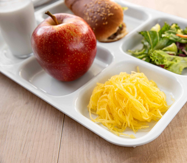 school lunch tray with apple and spaghetti squash