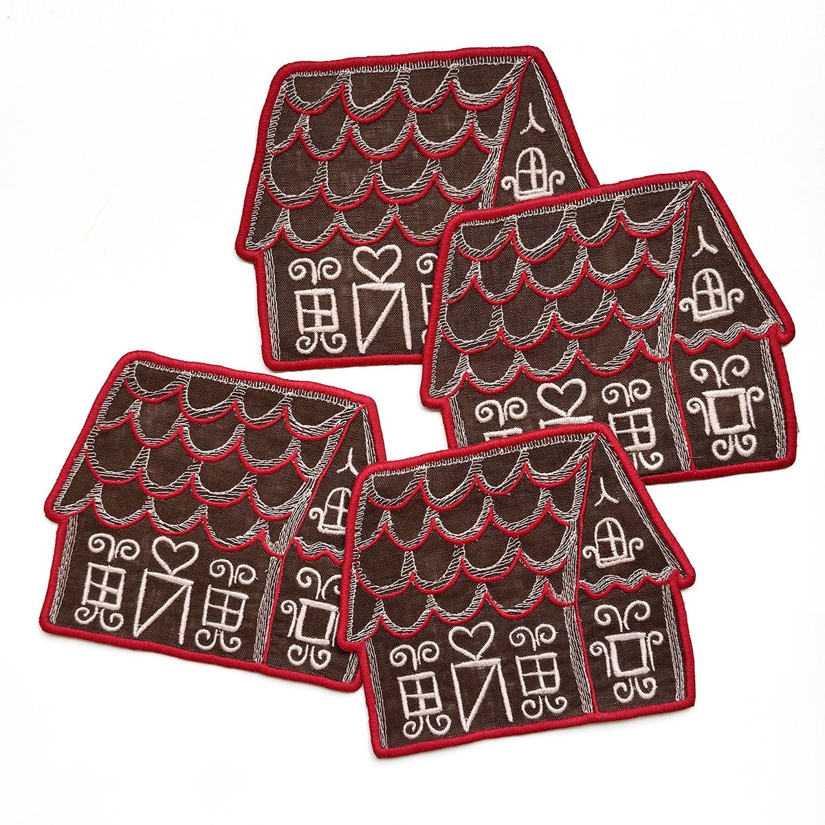 Gingerbread House Cocktail Napkin

Set of 4
6" x 6" 
Linen with embroidery
Designed for Biscuit Home in 2024