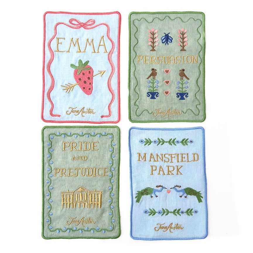 Jane Austen Covers Cocktail Napkin

Set of 4
6" x 9"
Linen with embroidery
Designed for Biscuit Home in 2024