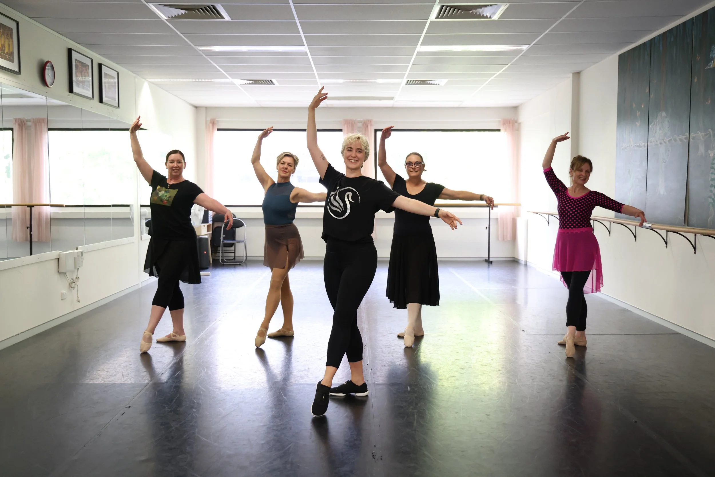 Ballet dance class for adults 55+ in a supportive studio environment