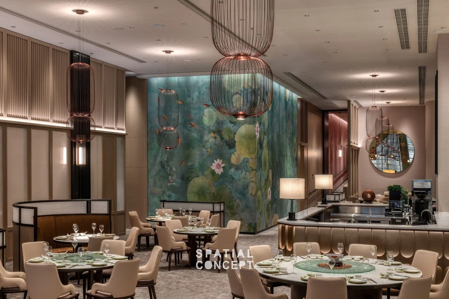 The Atrium&rsquo;s tall volume is celebrated through curated lighting, while a nature‑inspired mural with Chinese brush calligraphy conceals the kitchen windows and restores focus to the dining hall. A refined, tone‑on‑tone palette with modern Chines