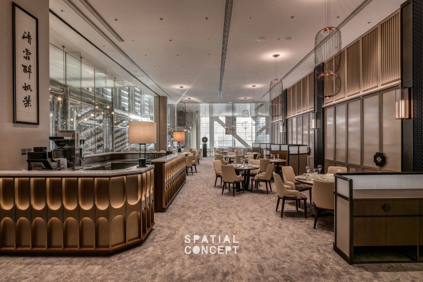 When licensing stipulates the bar stays in place, we enhance its efficiency. At The Atrium, we reconfigured the fixed bar for multiple jobs, including cashier, tea &amp; beverage service and serving counter; finished in warm wood and bronze with back