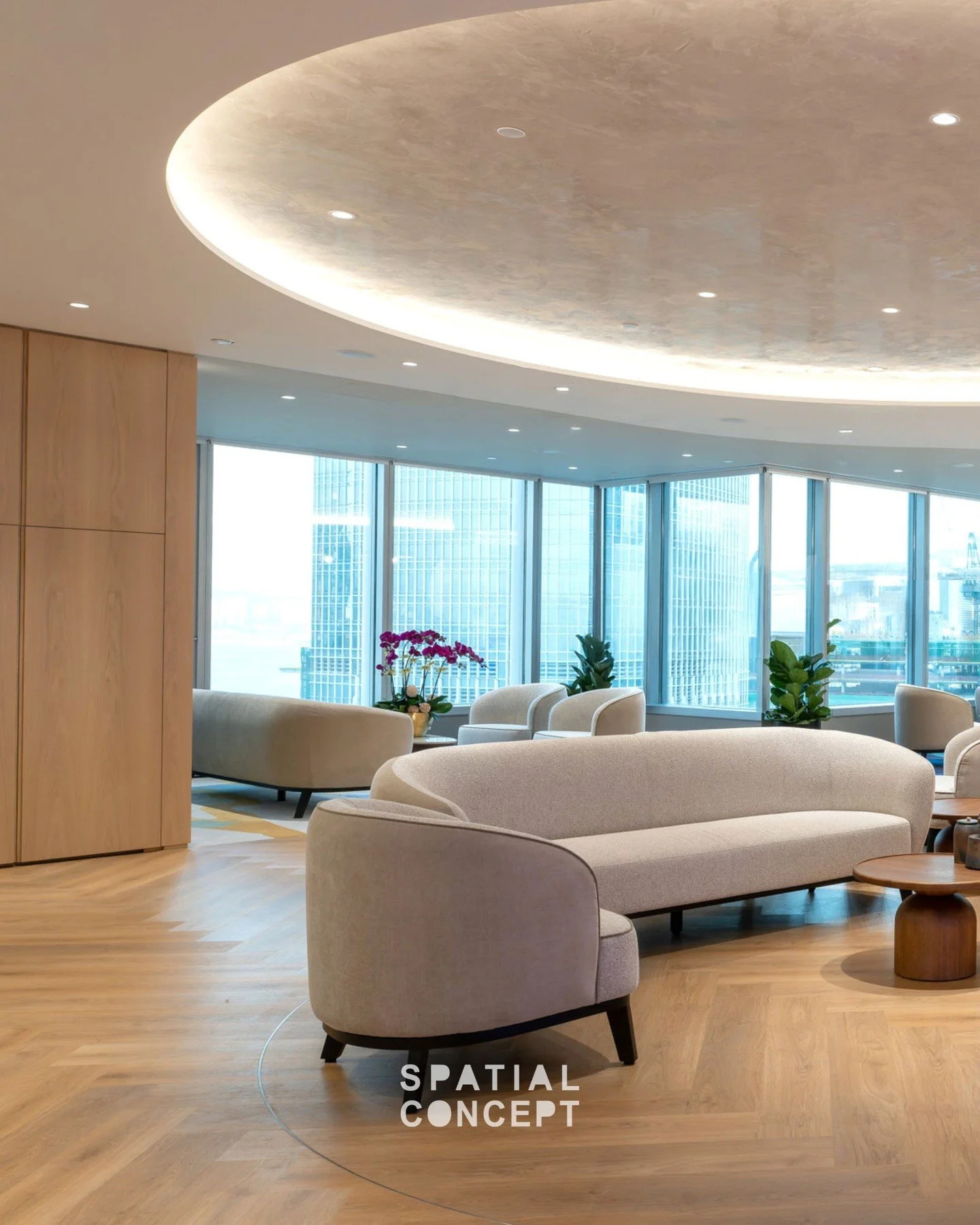 A calm, hospitality-led lounge invites clients to pause and connect at the @stancharthk &ndash; One IFC Wealth Management Centre.

At the bar island, marble with metallic finishes and a subtle floor light elevate the in‑house tea experience&mdash;bri