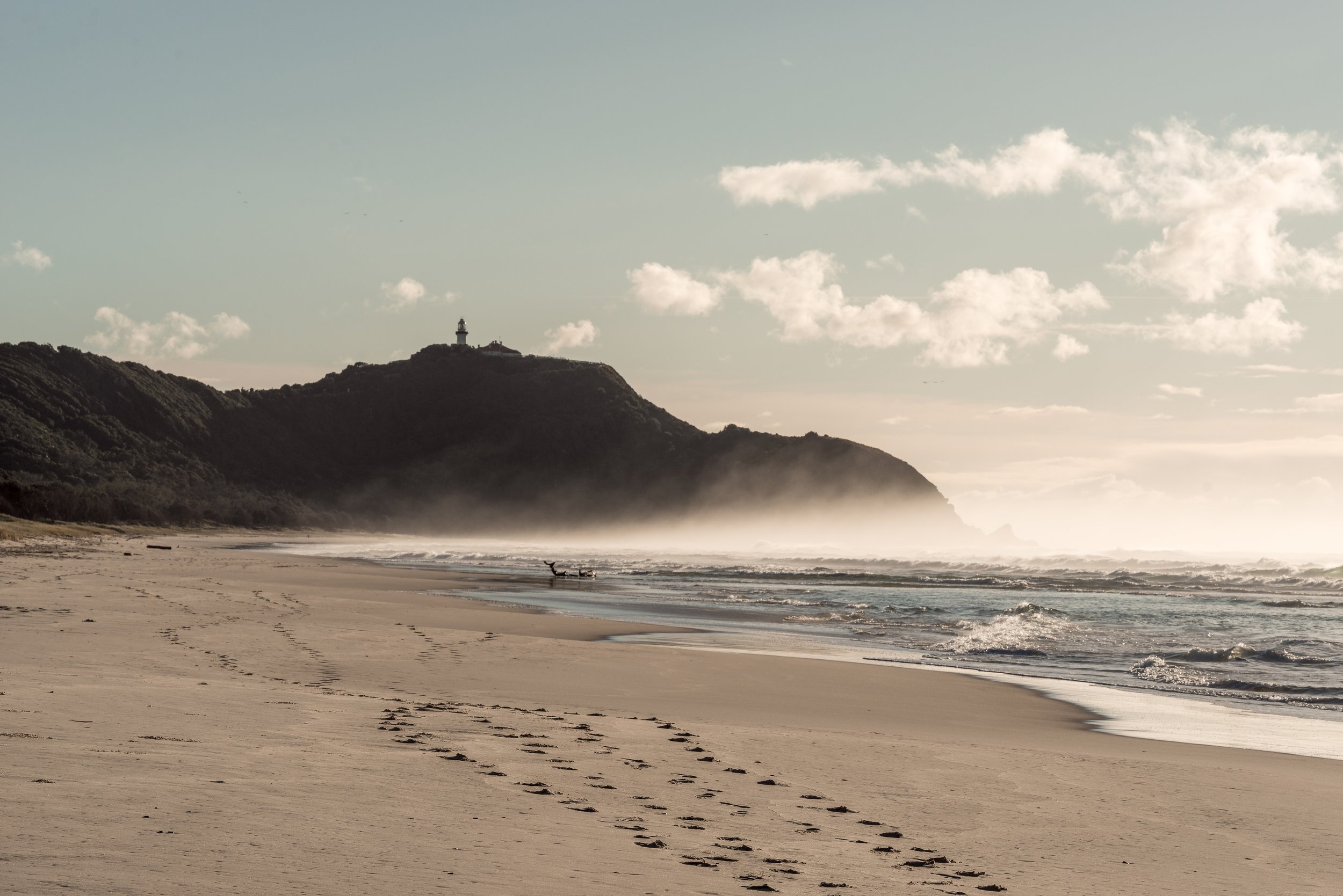 View of cape Byron Headland and the Byron Lighthouse from Tallows Beach, Byron Bay