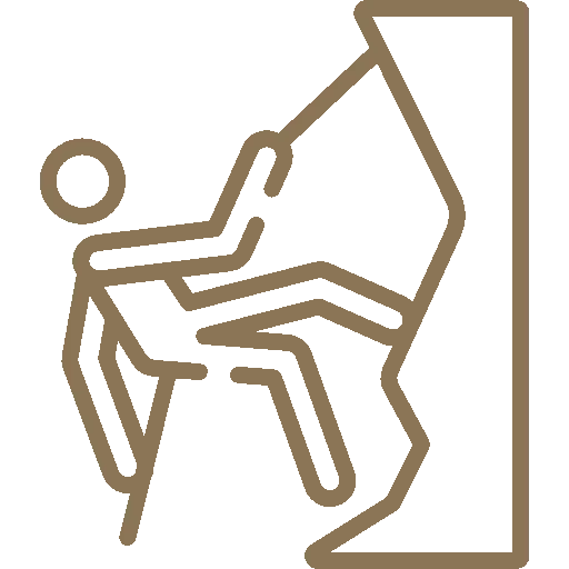 A brown dog lying on a bed with white sheets.