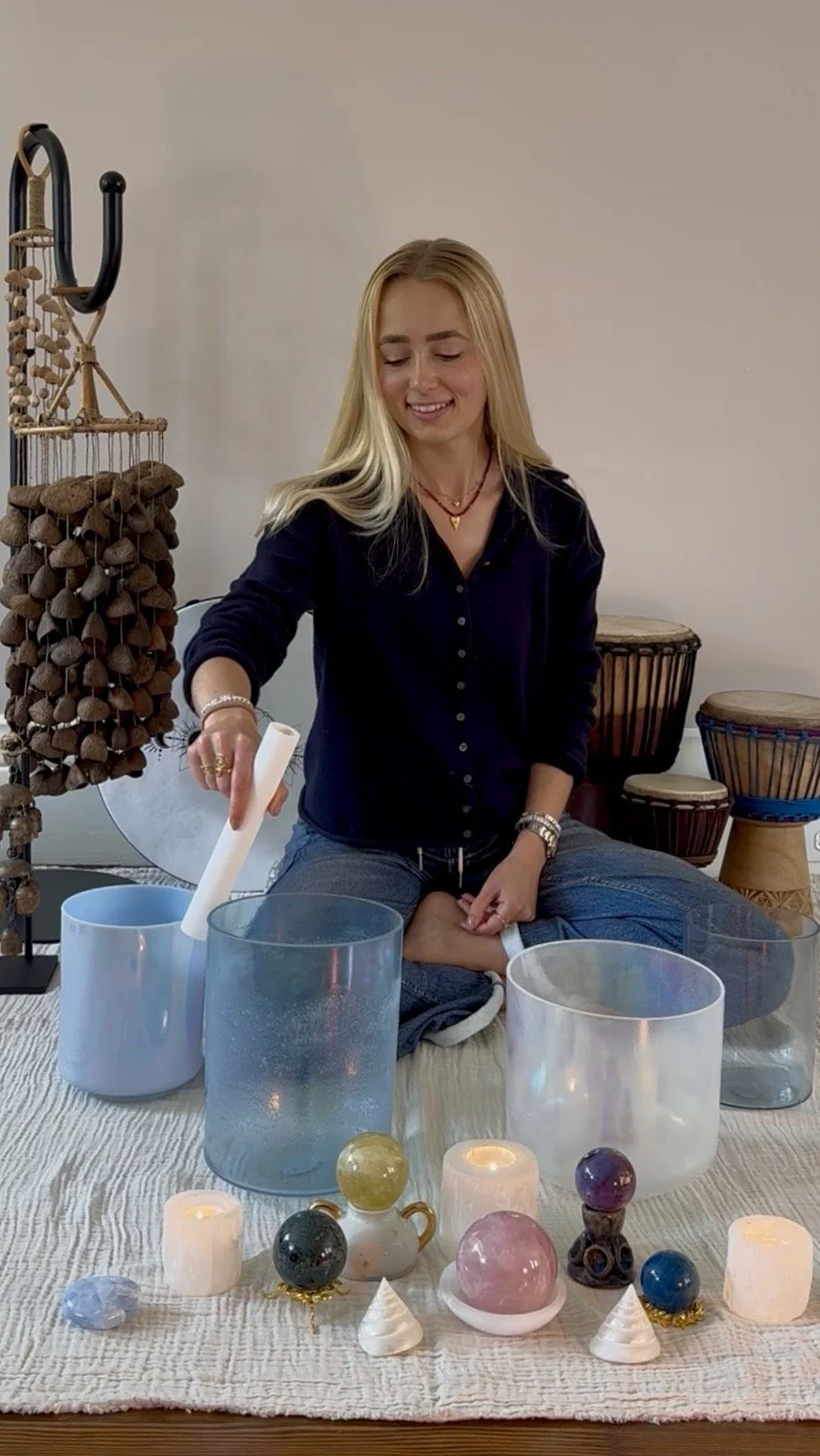 Audrey Bjorklund playing crystal sound bowls