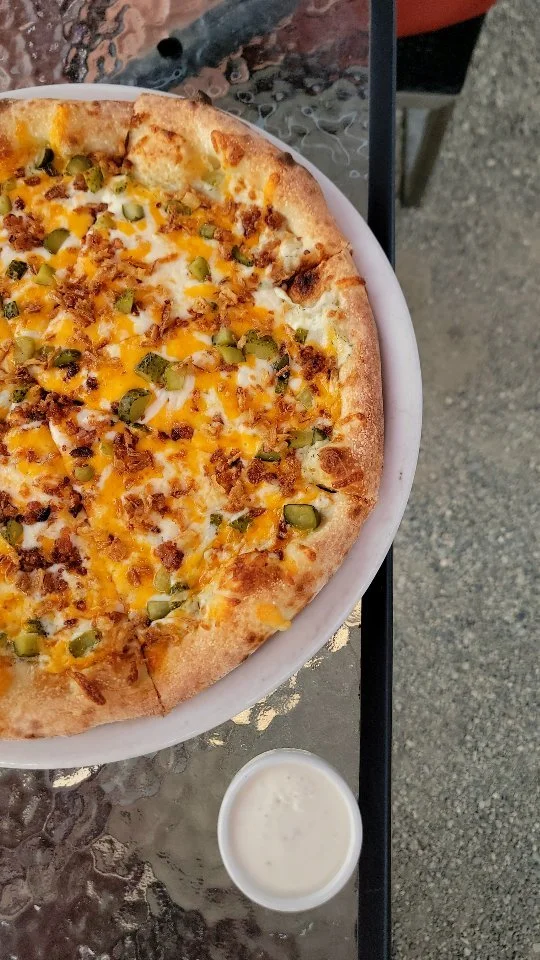 Obsessed. Addicted. Can’t stop thinking about it. 🥒🍕
Our Pickle Pizza is back for a limited time only at Blind Tiger Vineyards. Tangy, cheesy, crunchy perfection—aka your new fave.
Grab yours before it’s gone. 👀
#PicklePizza
