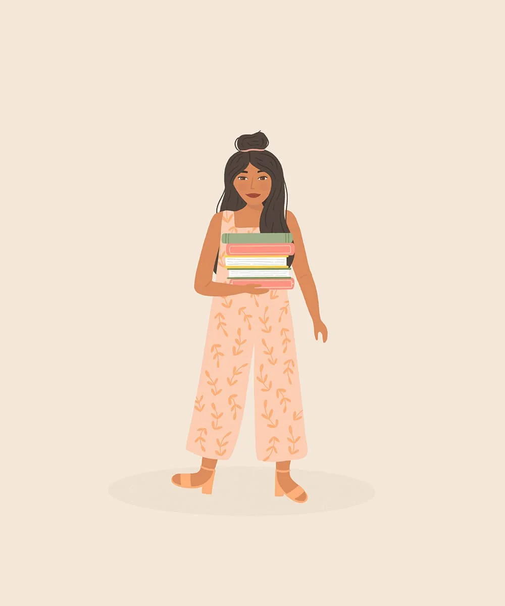 woman-in-romper-holding-books.jpg