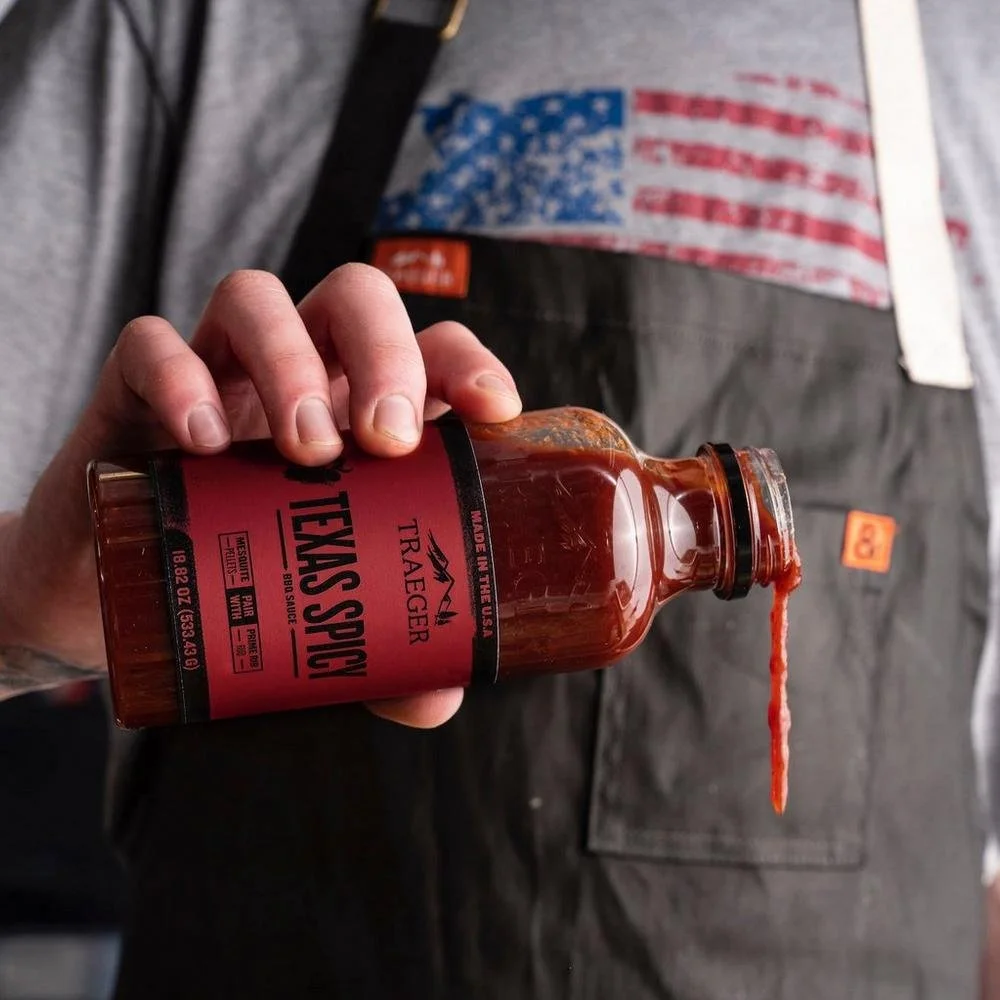 traeger-texas-spicy-bbq-sauce-lifestyle-pouring.jpeg