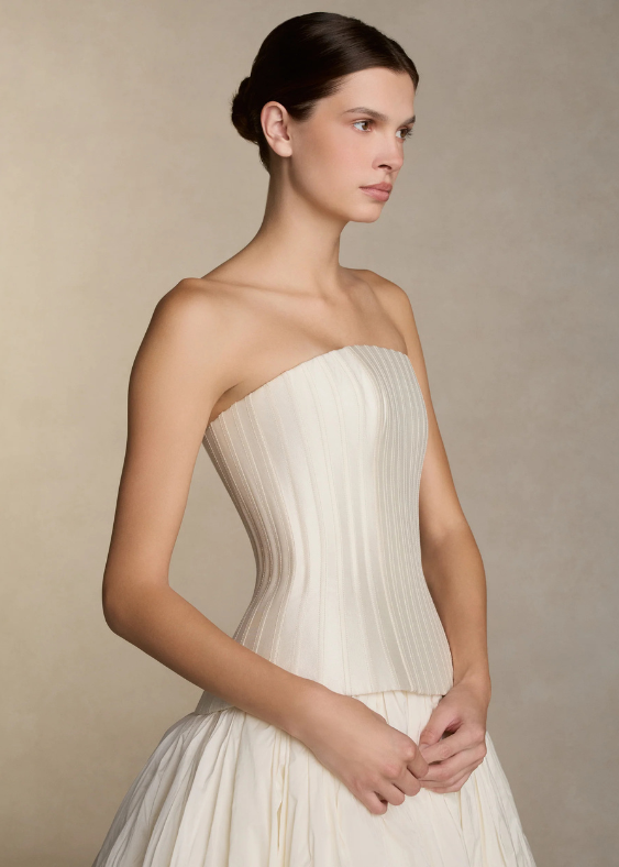 A close up of the designer details of a wedding buster and skirt by acclaimed designer Danielle Frankel stocked exclusively at Bloom Australia.