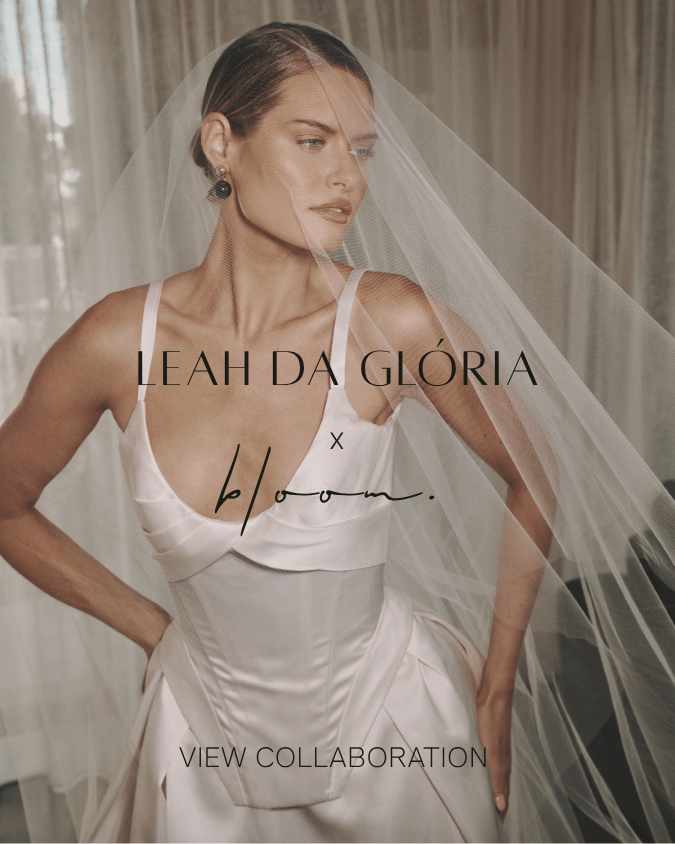 Modern luxury Australian bridal gown featuring a structured scooped neckline and sculpted basque waist. 