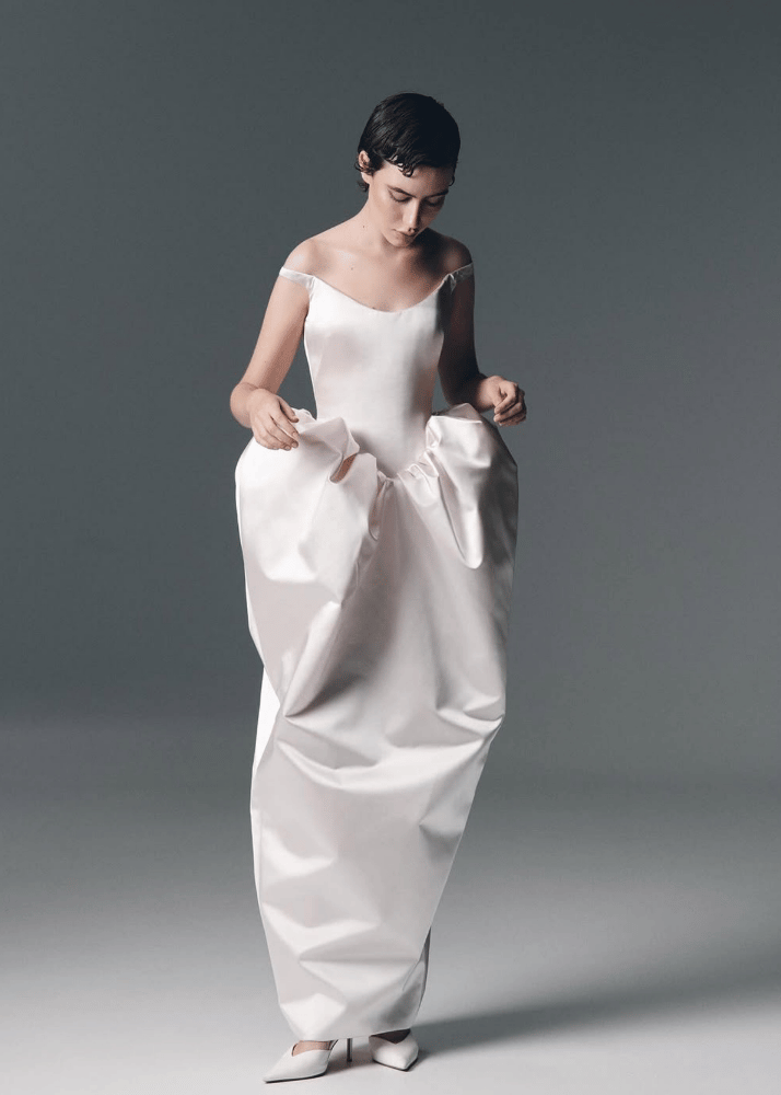 Modern luxury Australian bridal gown featuring a corseted scoop neck.