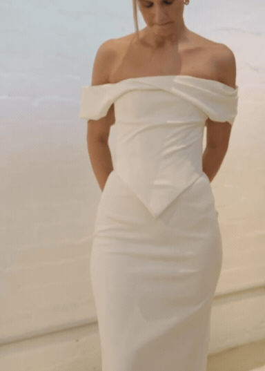 Studio footage of a contemporary australian bride in brisbane trying on bridal separates