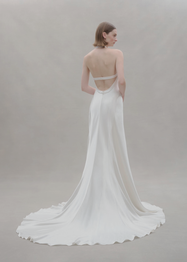 Minimalist Australian designer wedding dress in silk crepe and satin with a scooped back finish..
