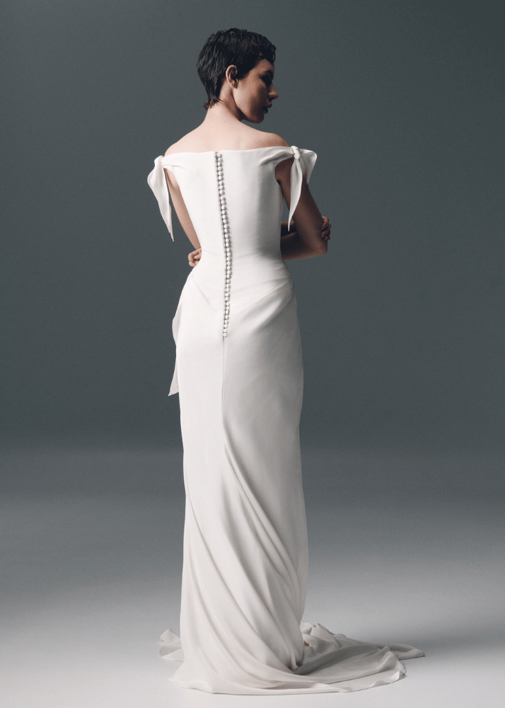 Contemporary Australian designer wedding dress featuring intricate button detailing at the back.