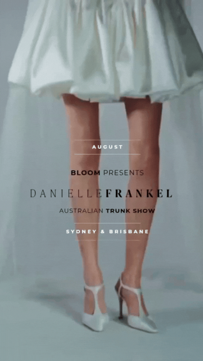 Poster featuring the lower half of a woman wearing a satin dress and white high-heeled shoes, promoting the Australian trunk show for Danielle Frankel in Sydney and Brisbane in August.