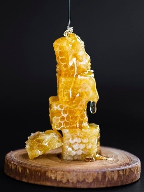 Honey+Pouring+On+Honeycombs.jpg
