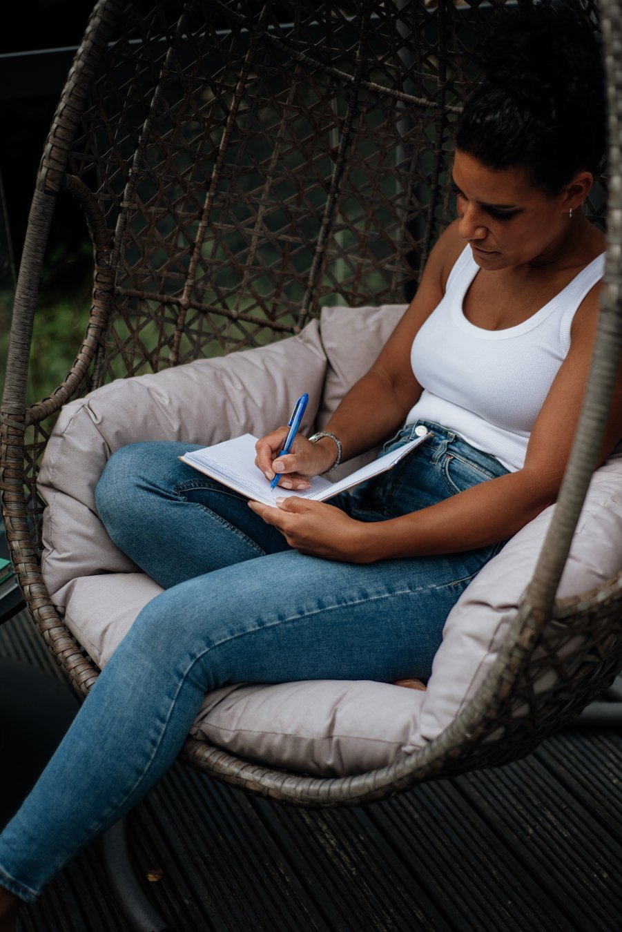 Nina, Nurtured Through Nature. Nina is writing in her journal.