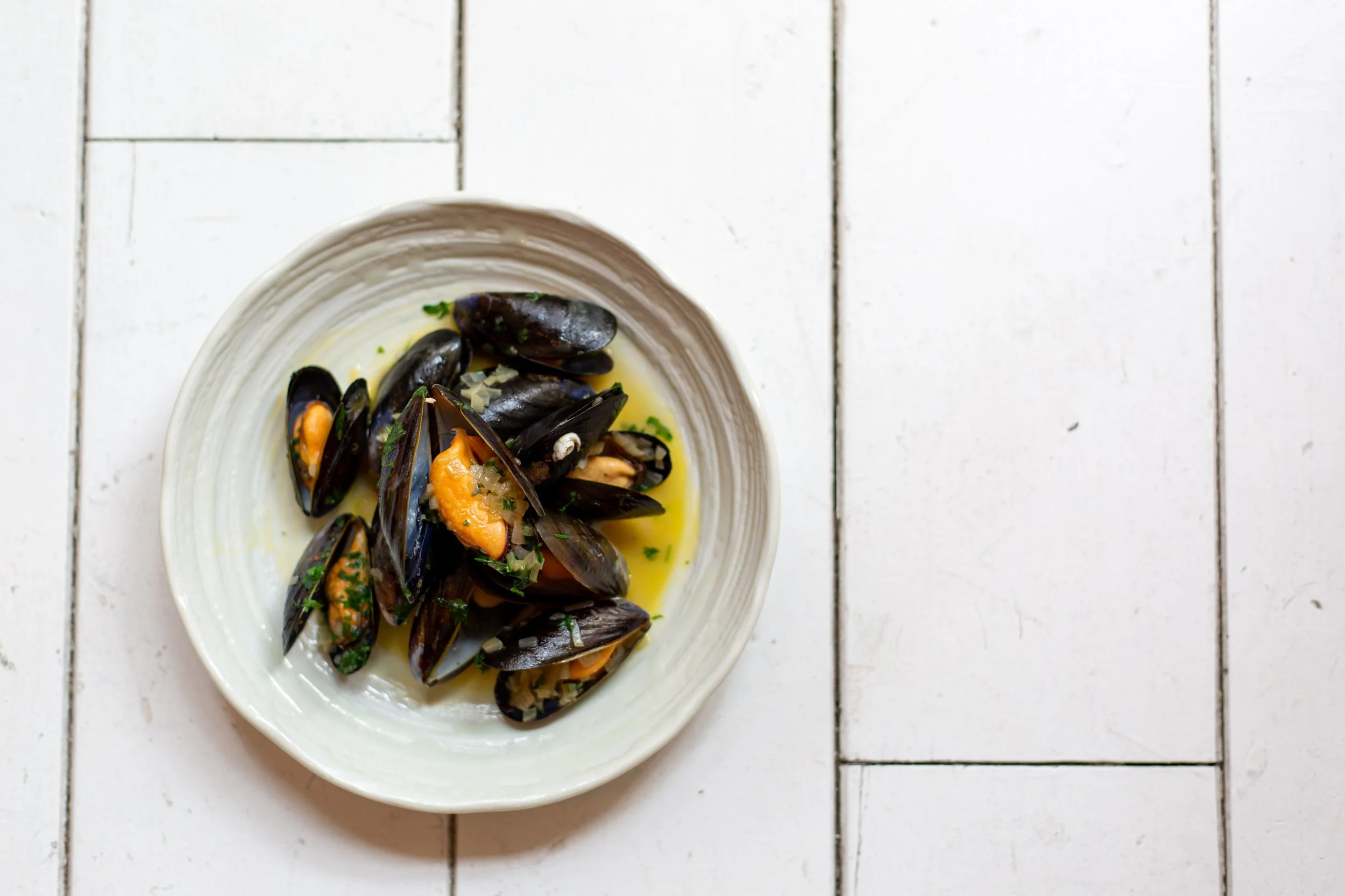 Mussels on white plate Tramshed Food Photography
