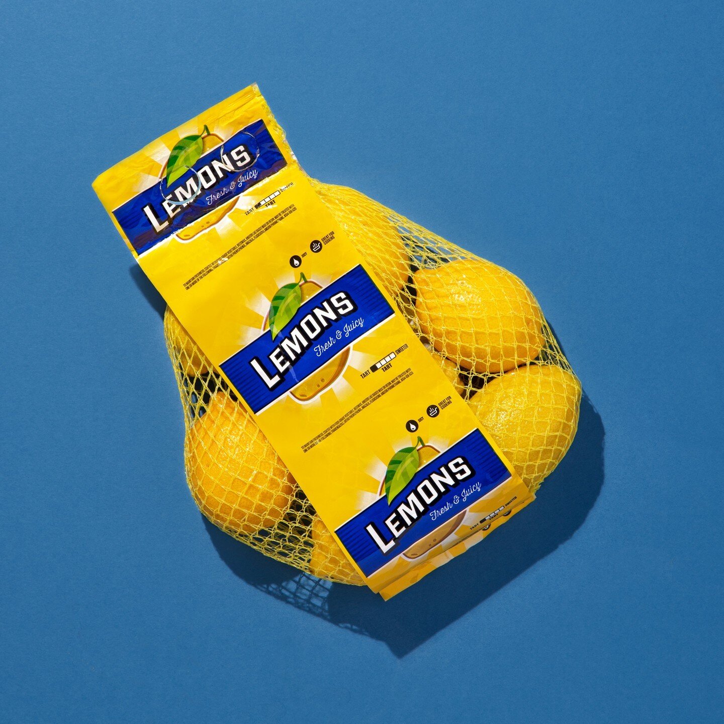 Netted produce bags are an interesting design challenge. Often the label repeats on a continuous roll and wraps completely around the bag as seen in this lemon packaging for Walmart.