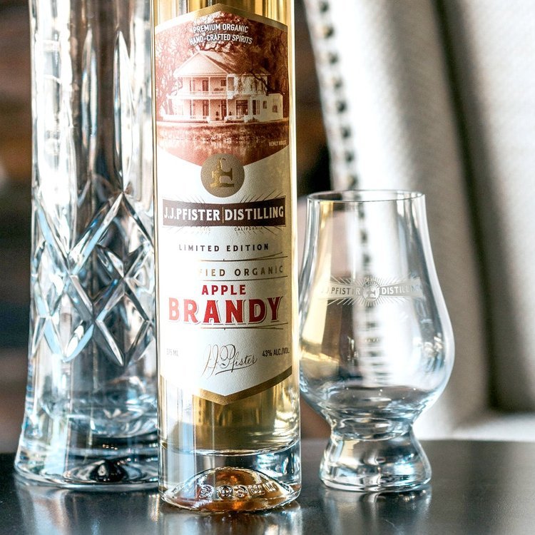 J.J Pfister Apple Brandy bottle on counter.