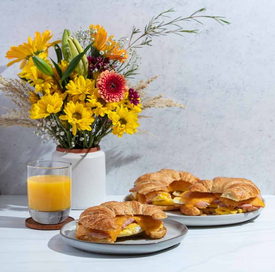 Ham, egg and cheese croissant made with Petaluma Egg Farm eggs.