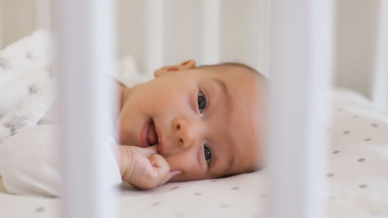 baby awake in crib