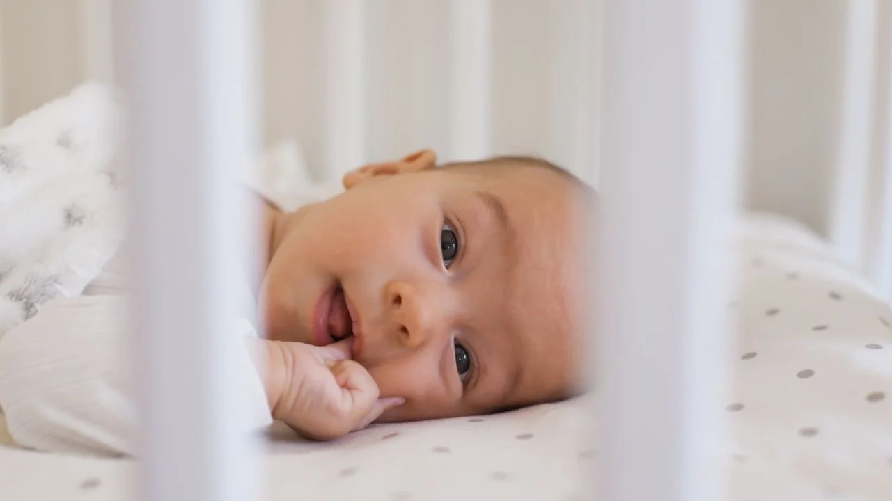 baby awake in crib