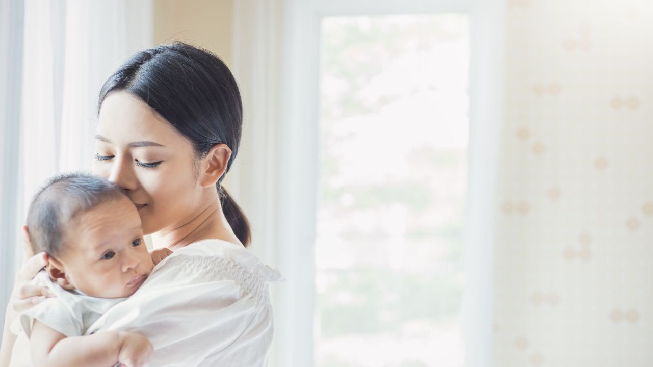happy mother with her newborn