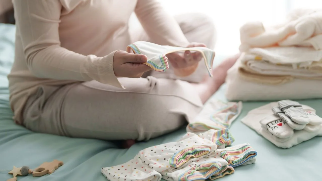 pregnant woman packing her hospital bag