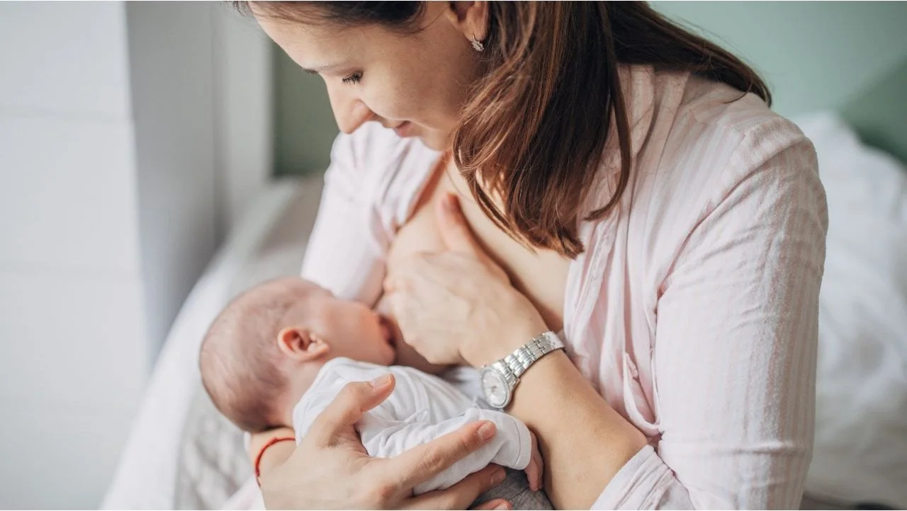 mother nursing her baby