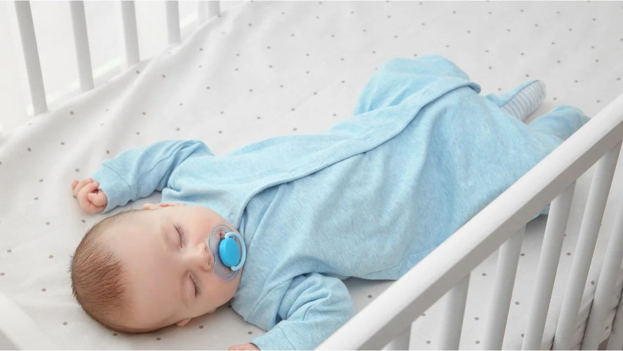 baby sleeping in crib