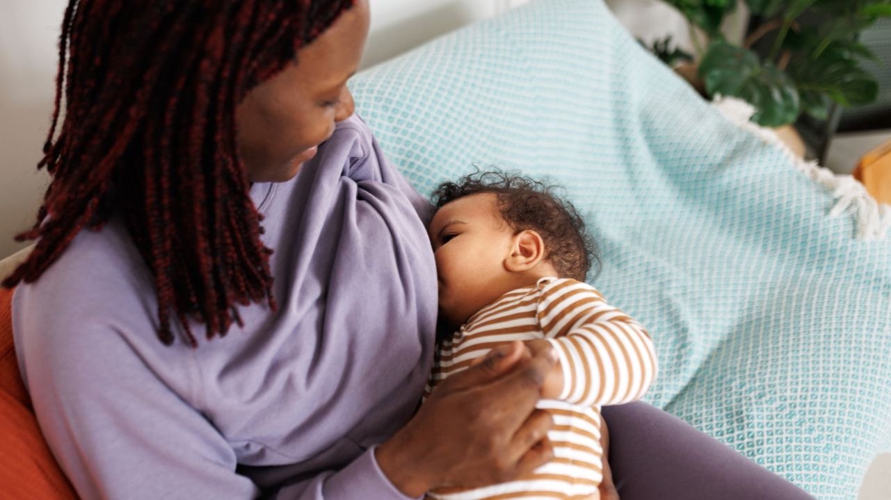 woman breastfeeding her baby