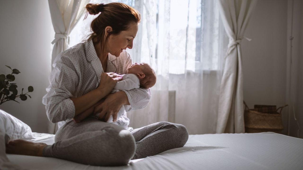 happy mother with her newborn