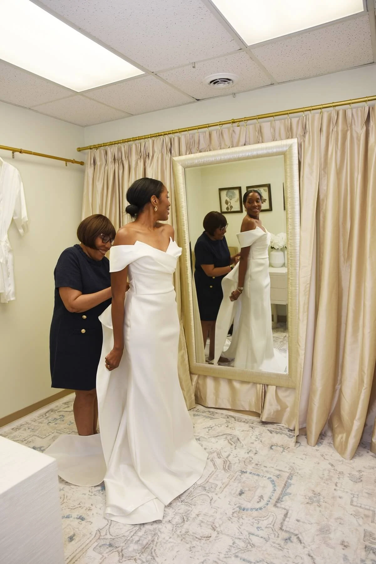 ashley-and-alexandrias-Bride-getting dress by stylist-