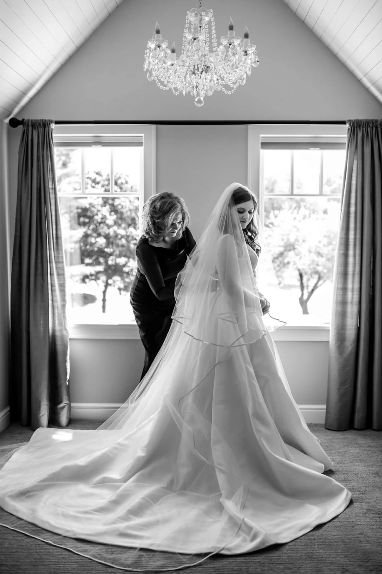 Mother and daughter preparing for the wedding day, Steven Birnbaum bridal at Ashley and Alexandrias luxury Bridal Southfield Michigan