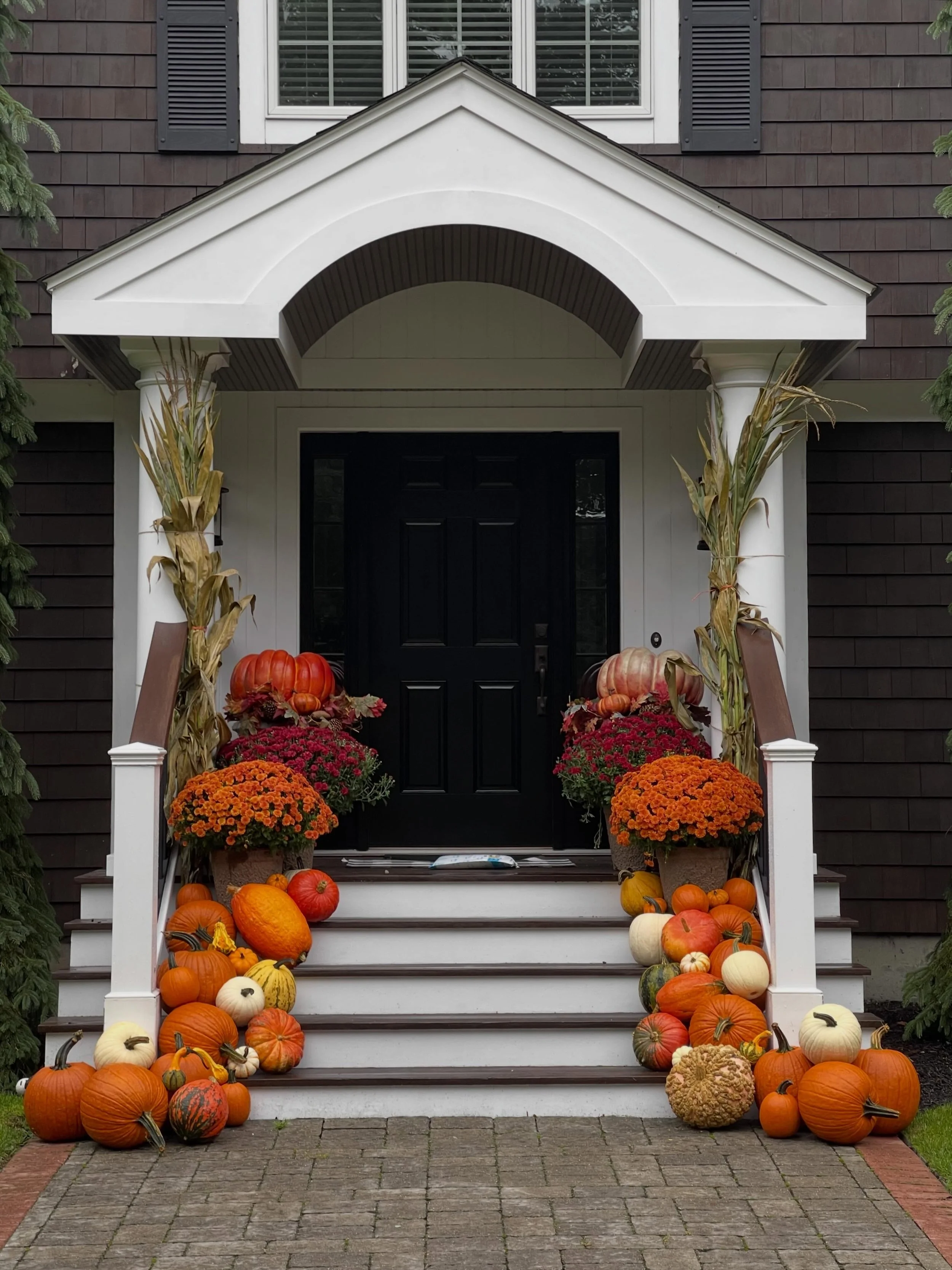 Consider this your sign to let us handle the pumpkins 🎃 

We bring the pumpkins.
We curate the layers.
We style every little detail.
You just enjoy the prettiest porch on the block 🍂

#porchstyling #fallporch #pumpkins #pumpkinseason
