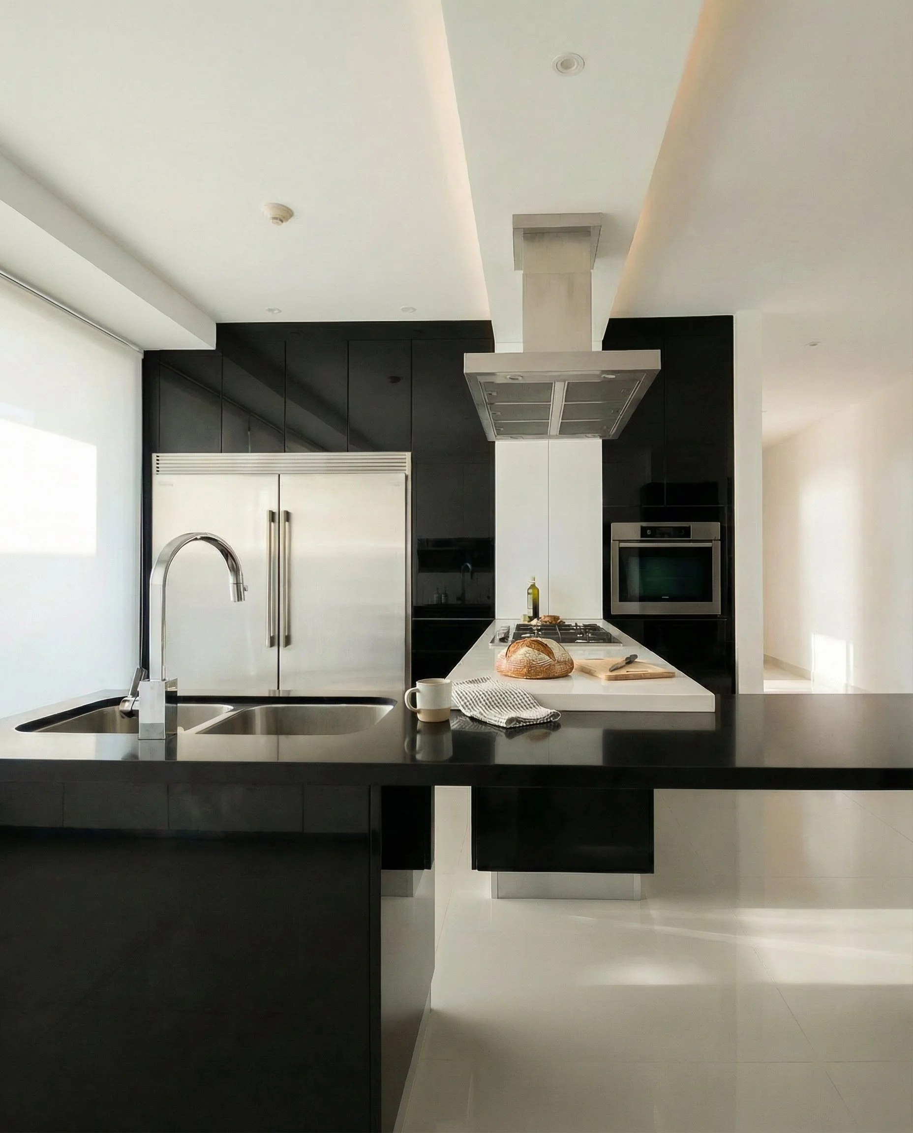 Minimalist in expression and modern in execution, it reinforces the penthouse’s overall architectural language while serving as a central gathering space.