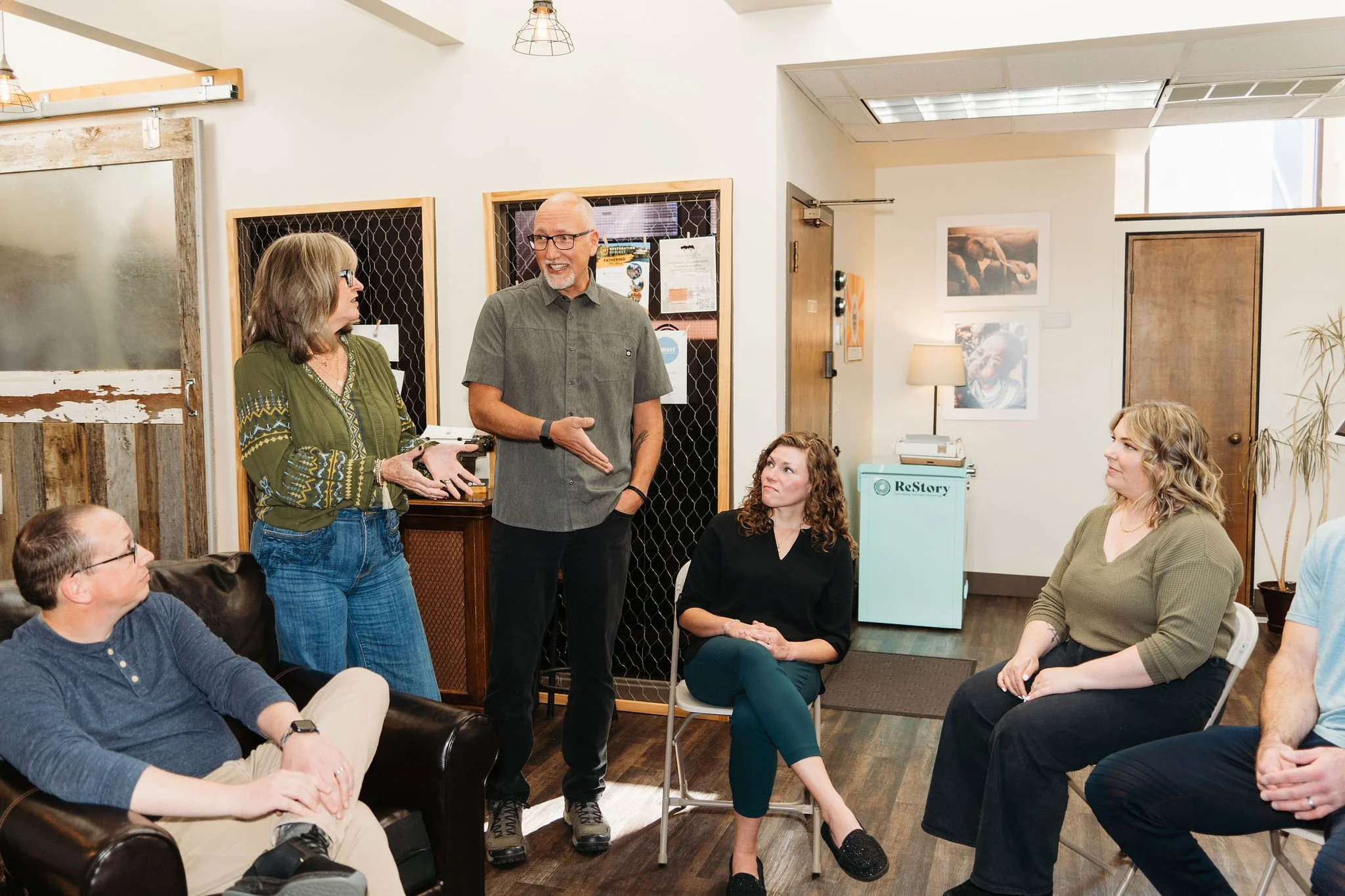 Tracy Johnson and Chris Bruno teach to a small group of storywork trainees.