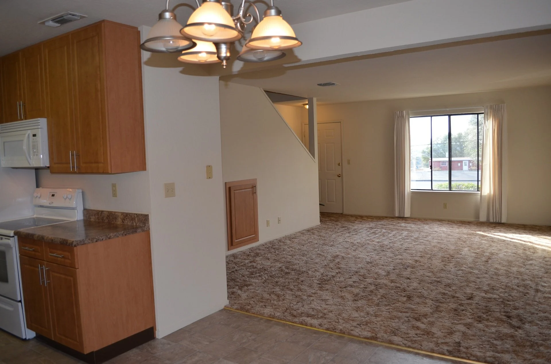 2-Bedroom townhome - view facing living room from kitchen.