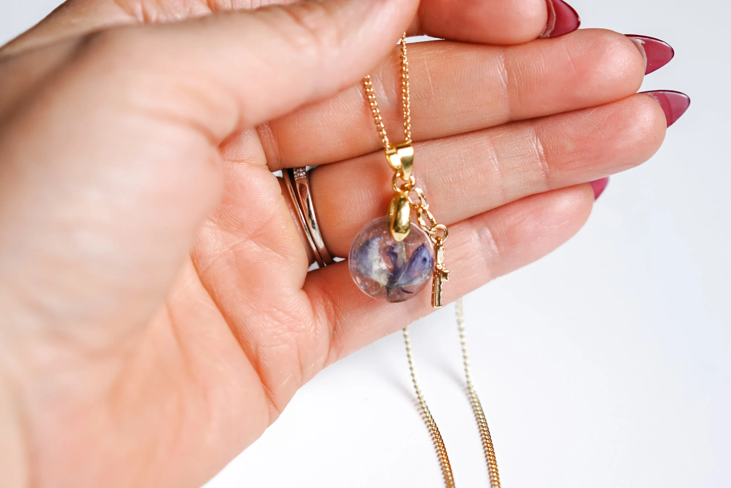 Purple Flower Cross Necklace 2.JPG