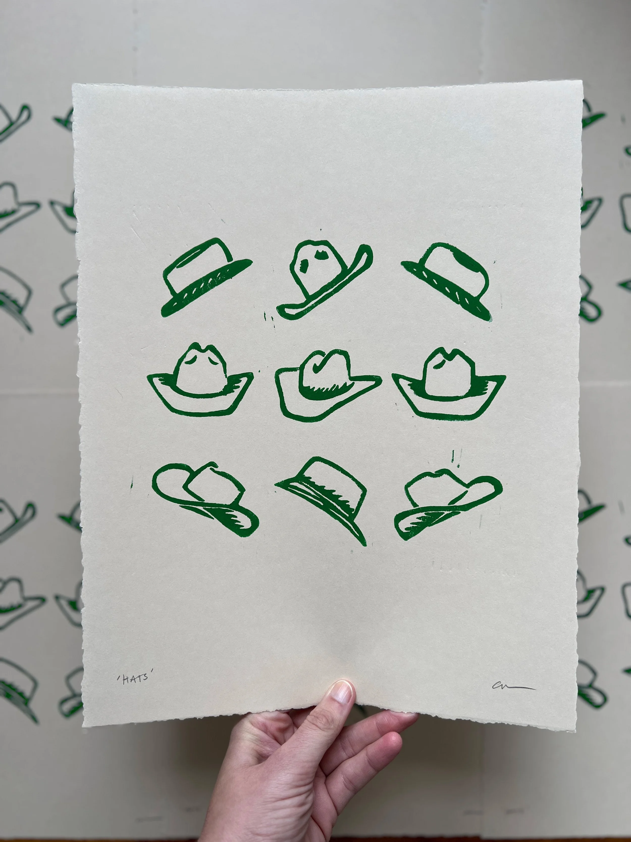 Ellen Orchard-Green Hats-Pile.jpg