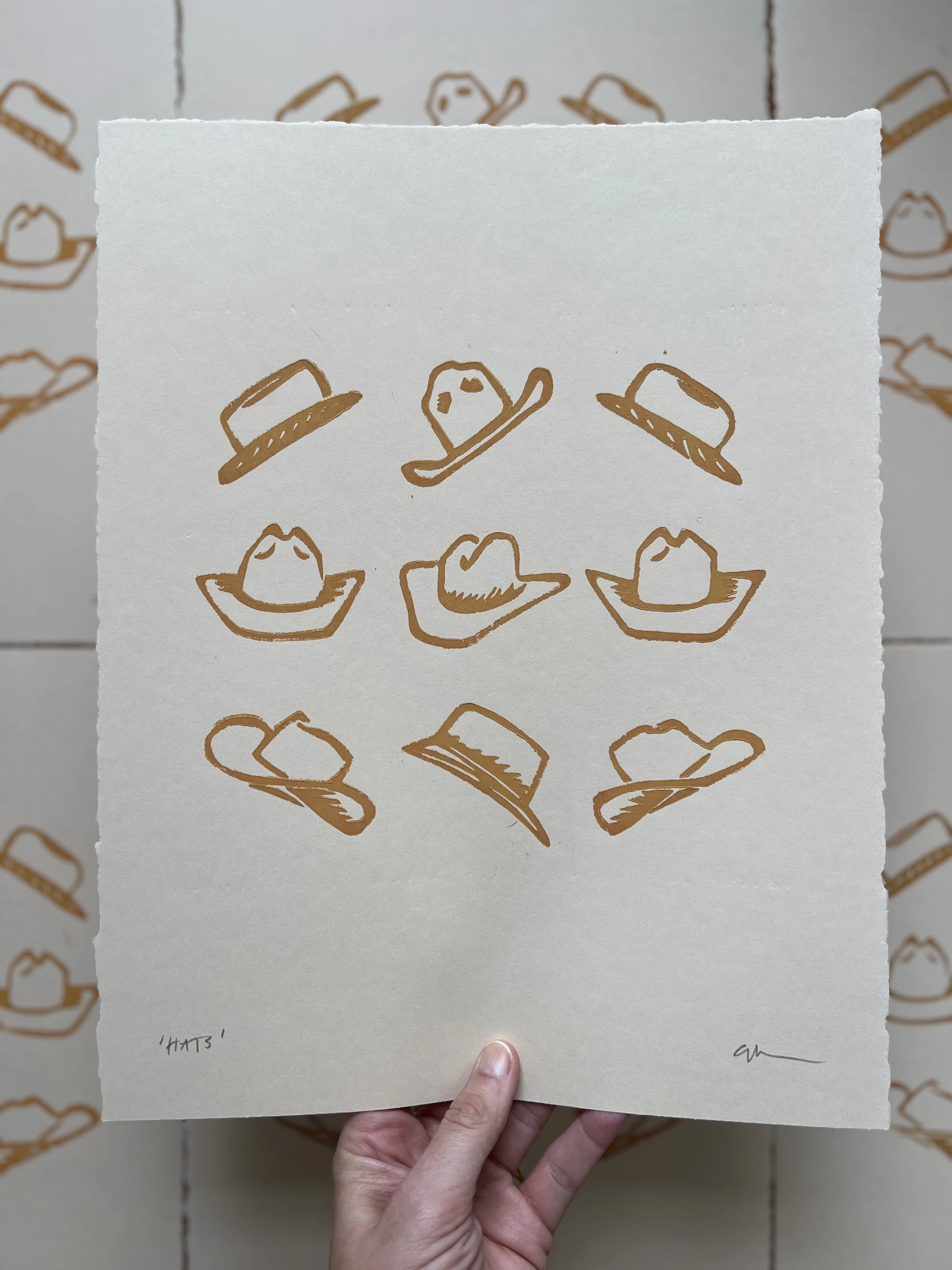 Ellen Orchard-Mustard Hats-Pile.jpg