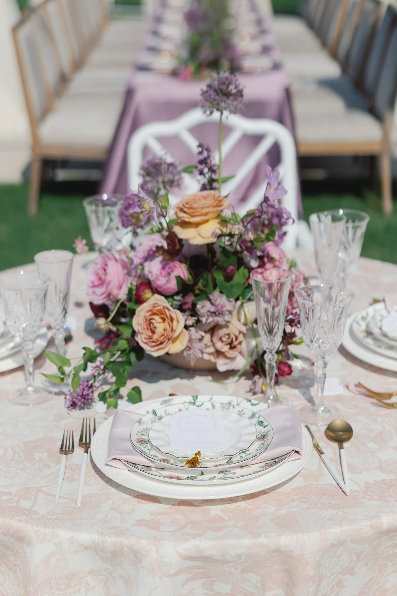 spring lavender wedding stationery table scape with unique menu card shape with gold tassel