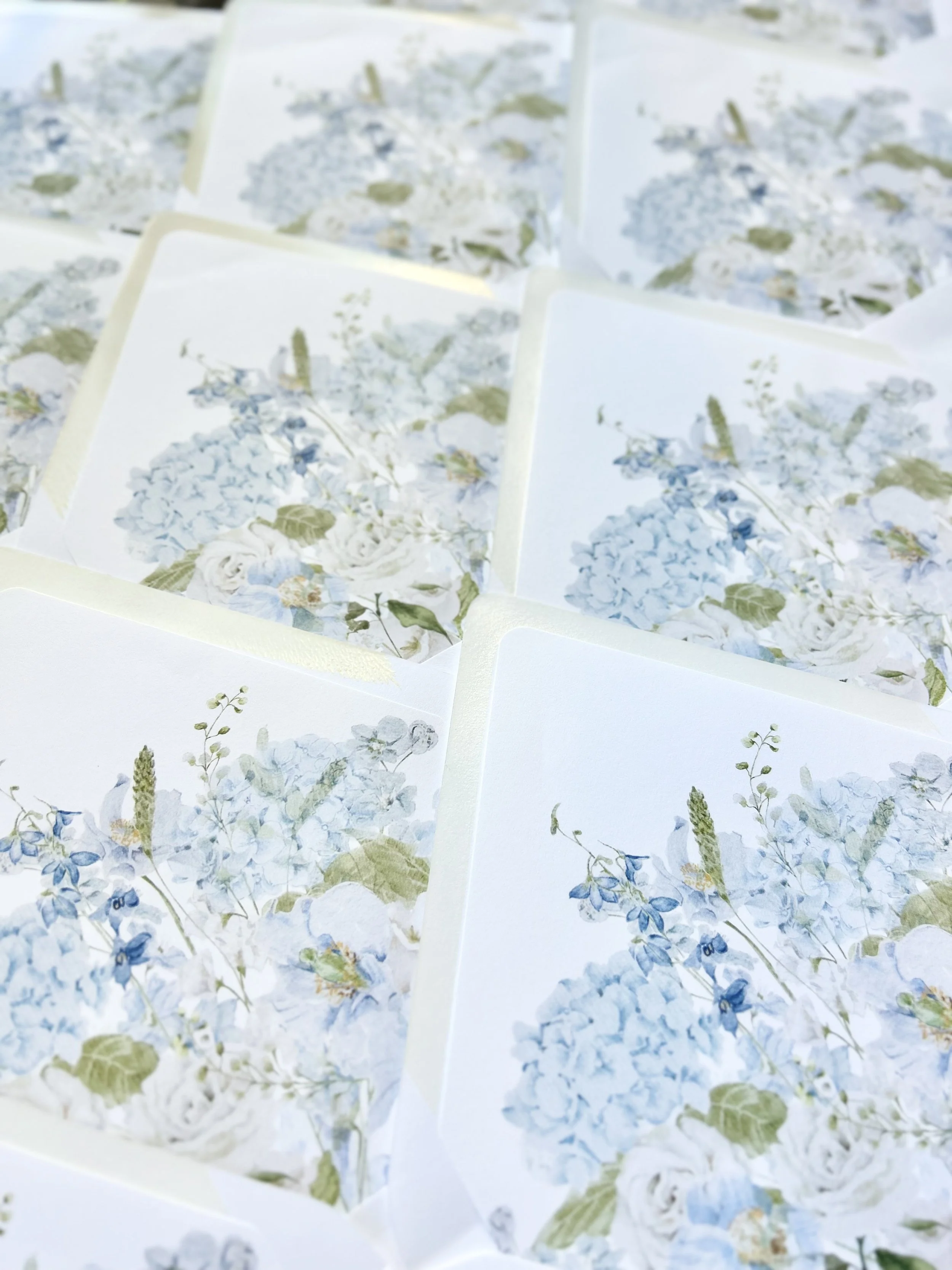 Gorgeous hand painted envelope liners with hydrangeas, forget-me-nots and white roses