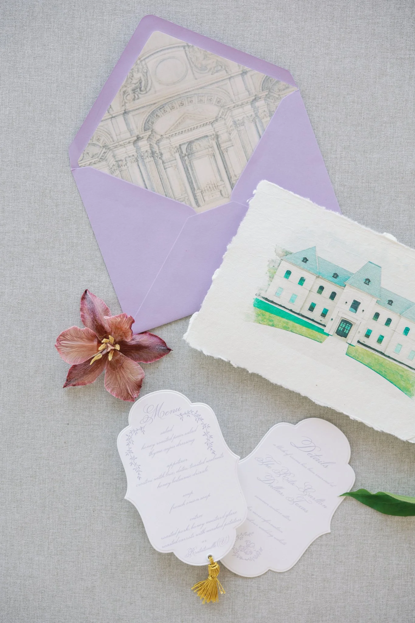 Dior luxury wedding invitations, with vintage architecture envelope liner, menu with unique shape details card and gold tassels