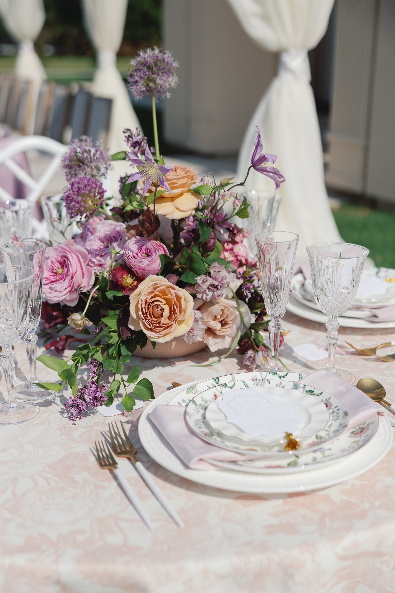 spring lavender wedding stationery table scape with unique menu card shape with gold tassel