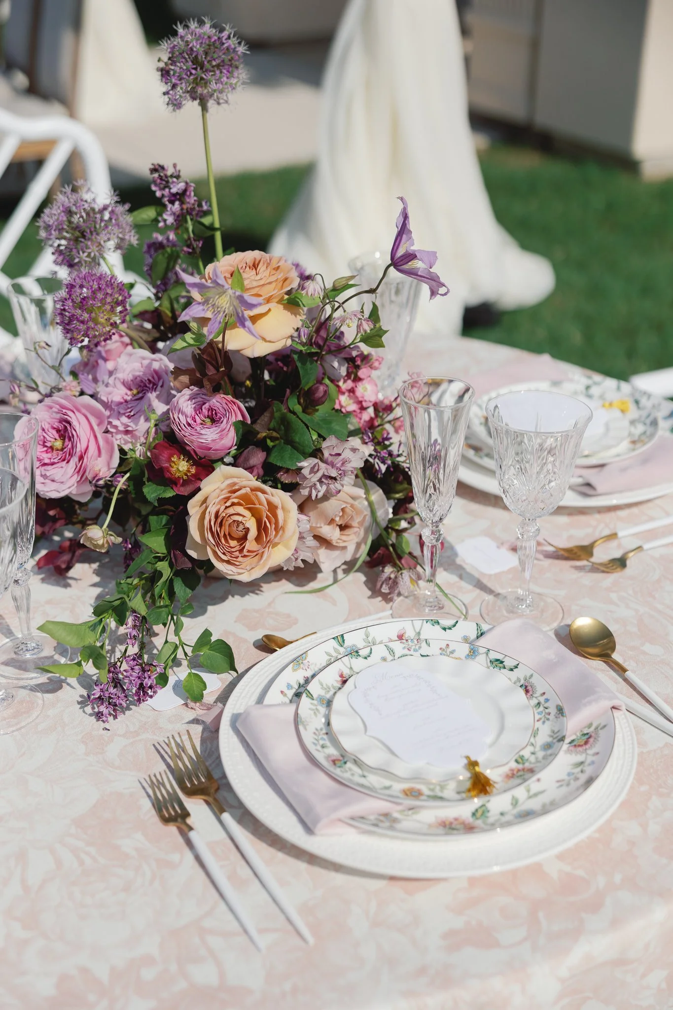 spring lavender wedding stationery table scape with unique menu card shape with gold tassel